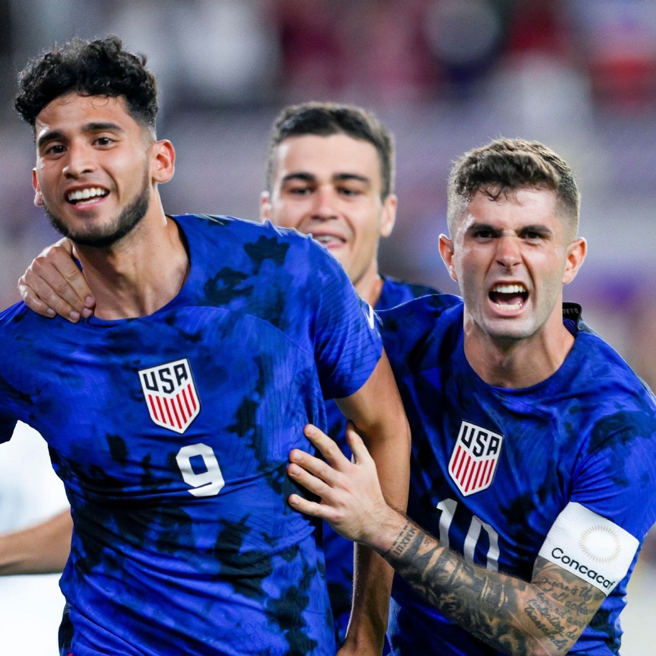 USMNT Pepe, Pulisic and Reyna celebrating a goal.