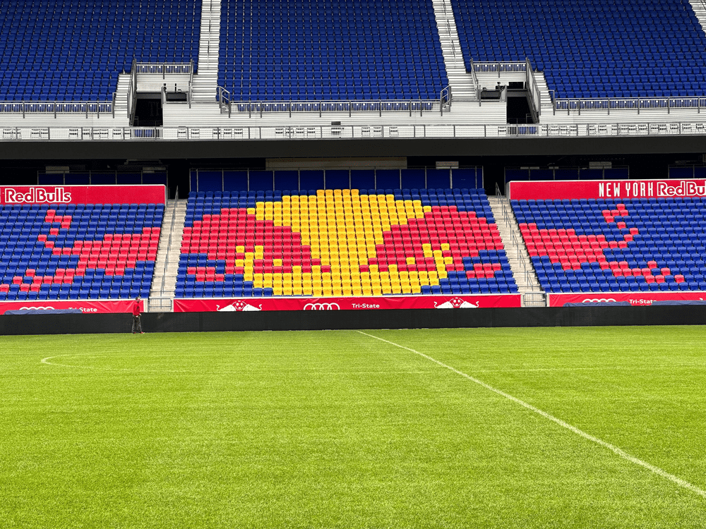 Red Bull Arena view cross field at midfield. You can see the dueling bulls in the seats.