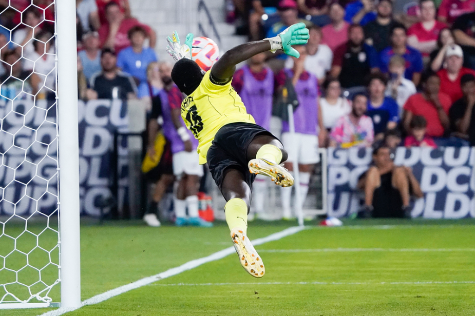 Photo Credit: Concacaf.com Diving Save by Saint Kitts and Nevis goalkeeper Julani Archibald on Jesus Ferreira of the U.S. Men's National Team.