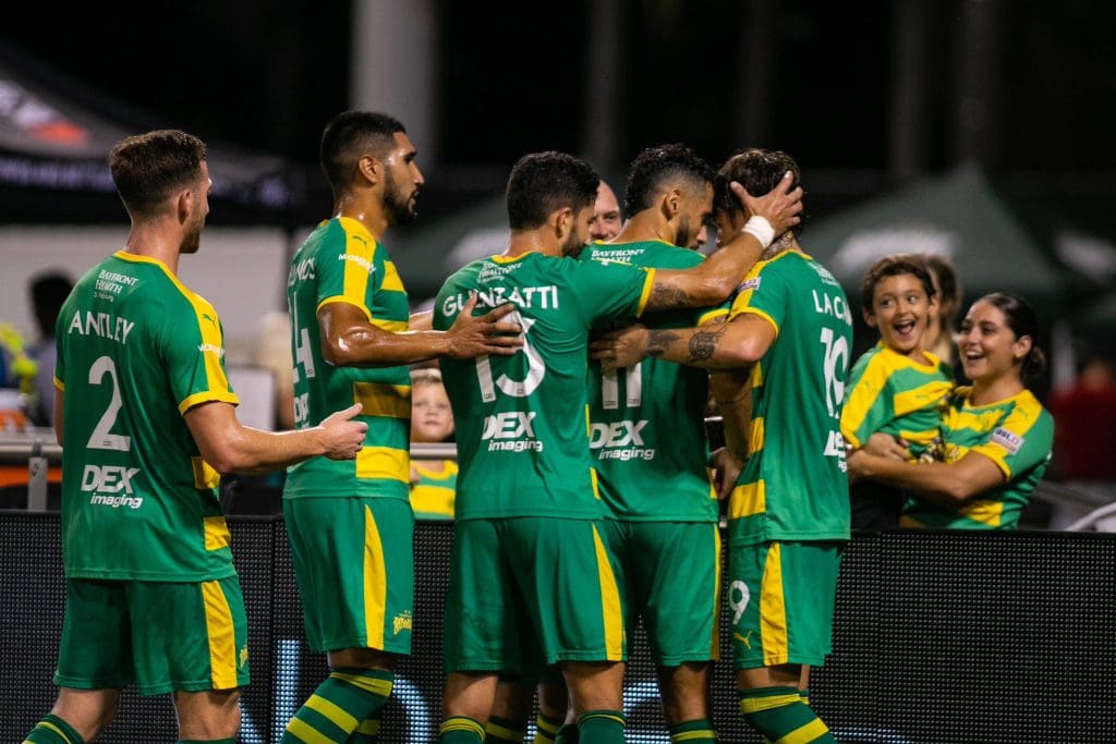 Tampa Bay Rowdies celebrate with Leo Fernandes in front of his family.