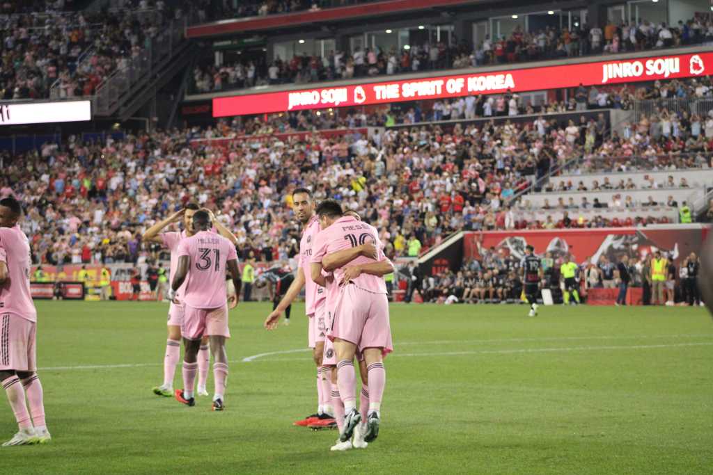 Inter Miami players congraulate Leo Messi on his first MLS goal. 
