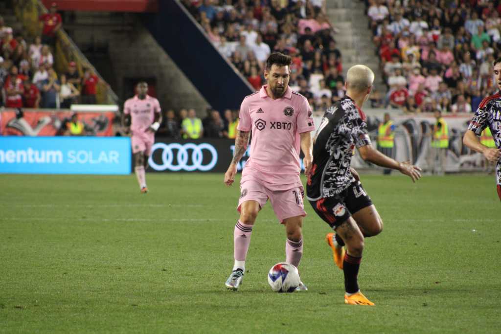 Inter Miami star Leo Messi goes one v one with New York Red Bulls wing back John "JMi" Tolkin.