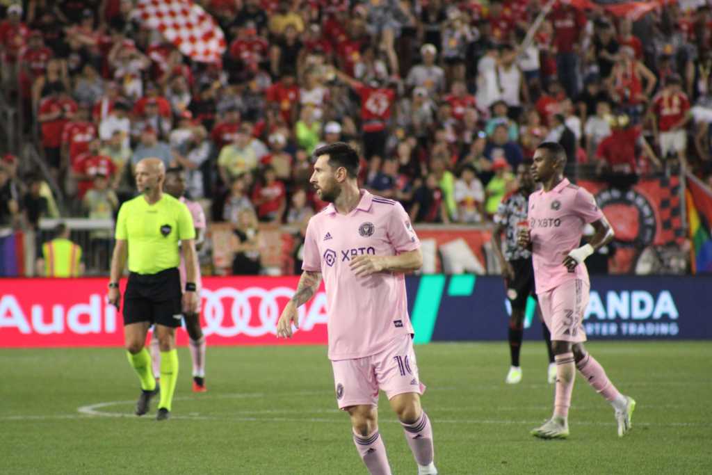 Inter Miami's star Leo Messi stalking the midfield looking for an opening. 