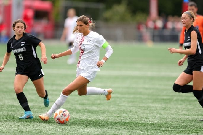 Jess scoring a goal. Mandtory Credit: St John's University