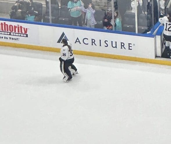 3/3/24 Minnesota Goalie skating out for first star. Mandatory Credit: PWHL