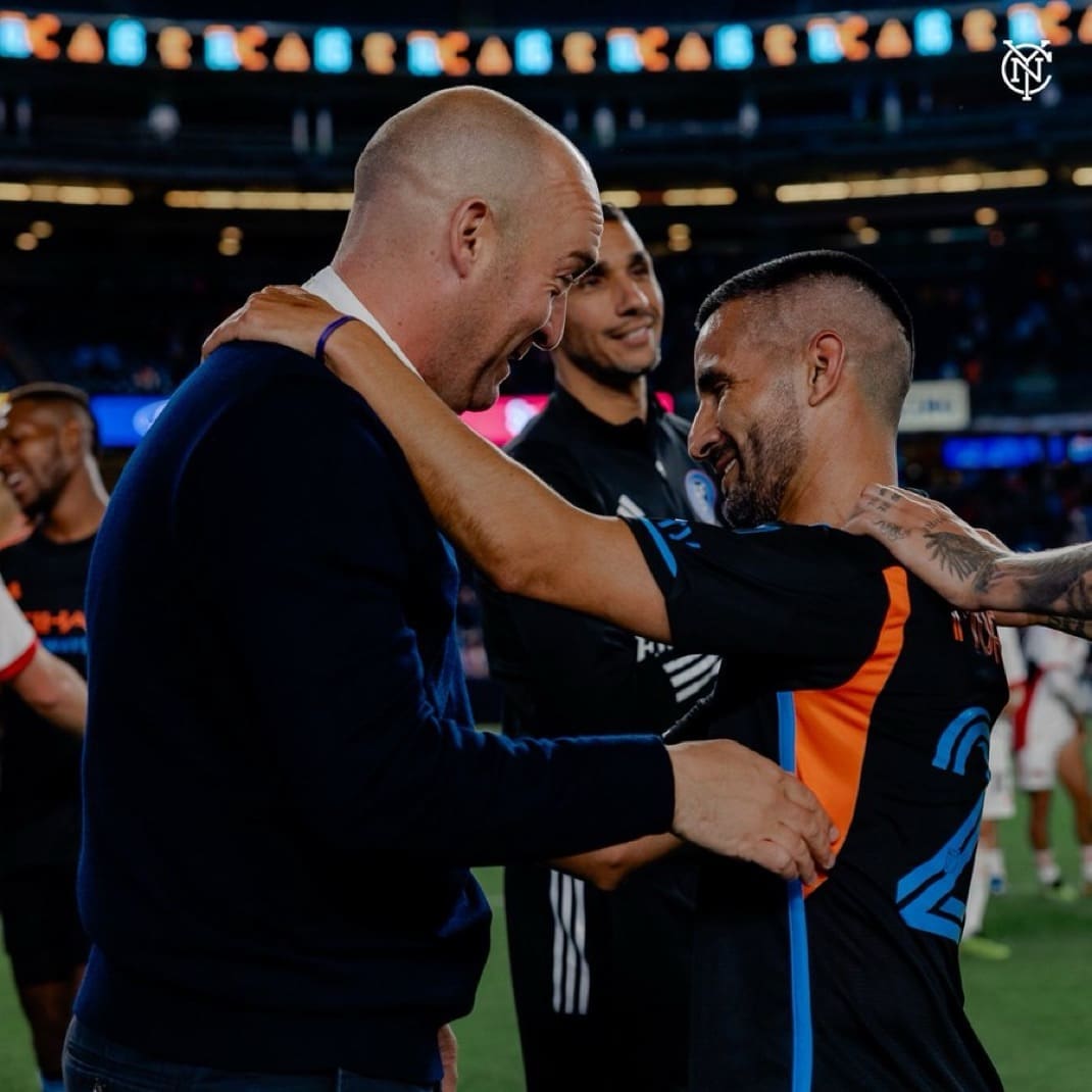 Nick Cushing NYCFC Head Coach having a moment post match with veteran player Maxi Morales