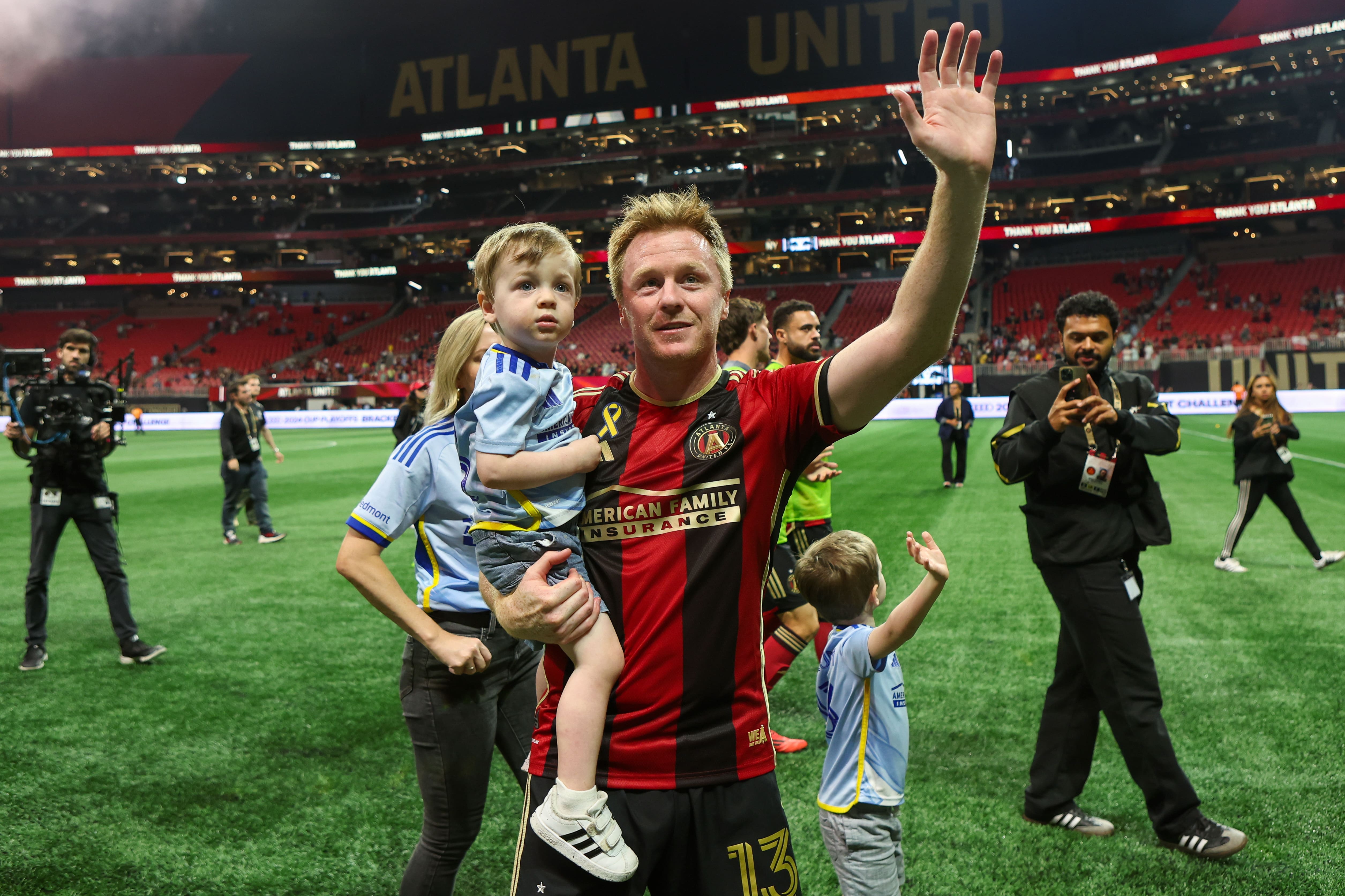 Oct 5, 2024; Atlanta, Georgia, USA; Atlanta United midfielder Dax McCarty (13) waves to the crowd after a victory over the New York Red Bulls at Mercedes-Benz Stadium. Mandatory Credit: Brett Davis-Imagn Images