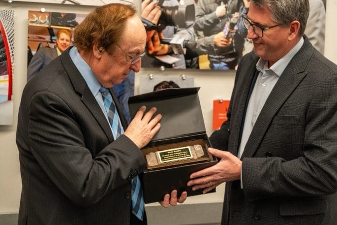 11/29/24 Philadelphia, PA Wells Fargo Center| Ahead of today’s game, Keith Jones presented New York Rangers longtime broadcaster Sam Rosen with an engraved Spectrum brick to commemorate his final game in Philadelphia. The Hockey Hall of Fame broadcaster has been the voice of the Rangers for the last 40 years.Mandatory Credit:Philadelphia Flyers