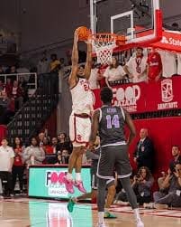 Photo of Zuby Ejiofor dunking at home. Mandatory Credit: St Johns University