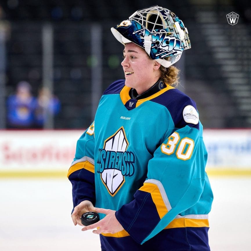 1/12/25 Newark, NJ Prudential Center| Corrine Schroeder 1st star tossing puck to fan following win and star announcement. Mandatory Credit: The Local W/Joe Peng