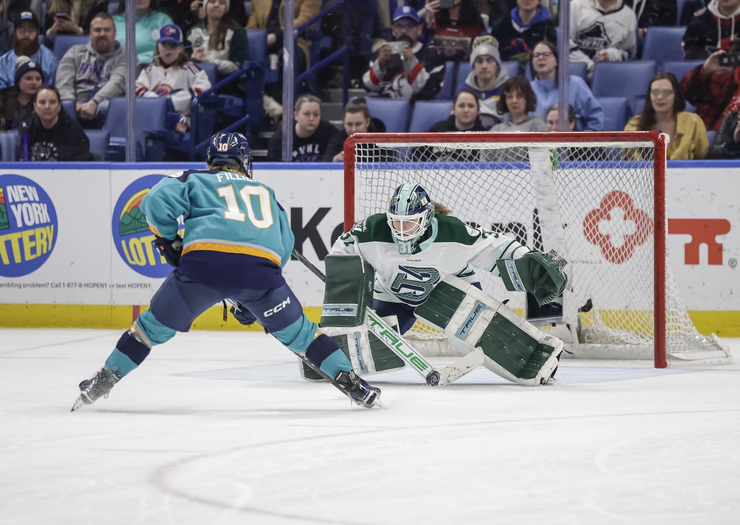 2/23/25 Buffalo, NY KeyBank Arena| Boston Fleet Tendy Aerin Frankel stops New York rookie Sarah Fillier. Mandatory Credit: PWHL
