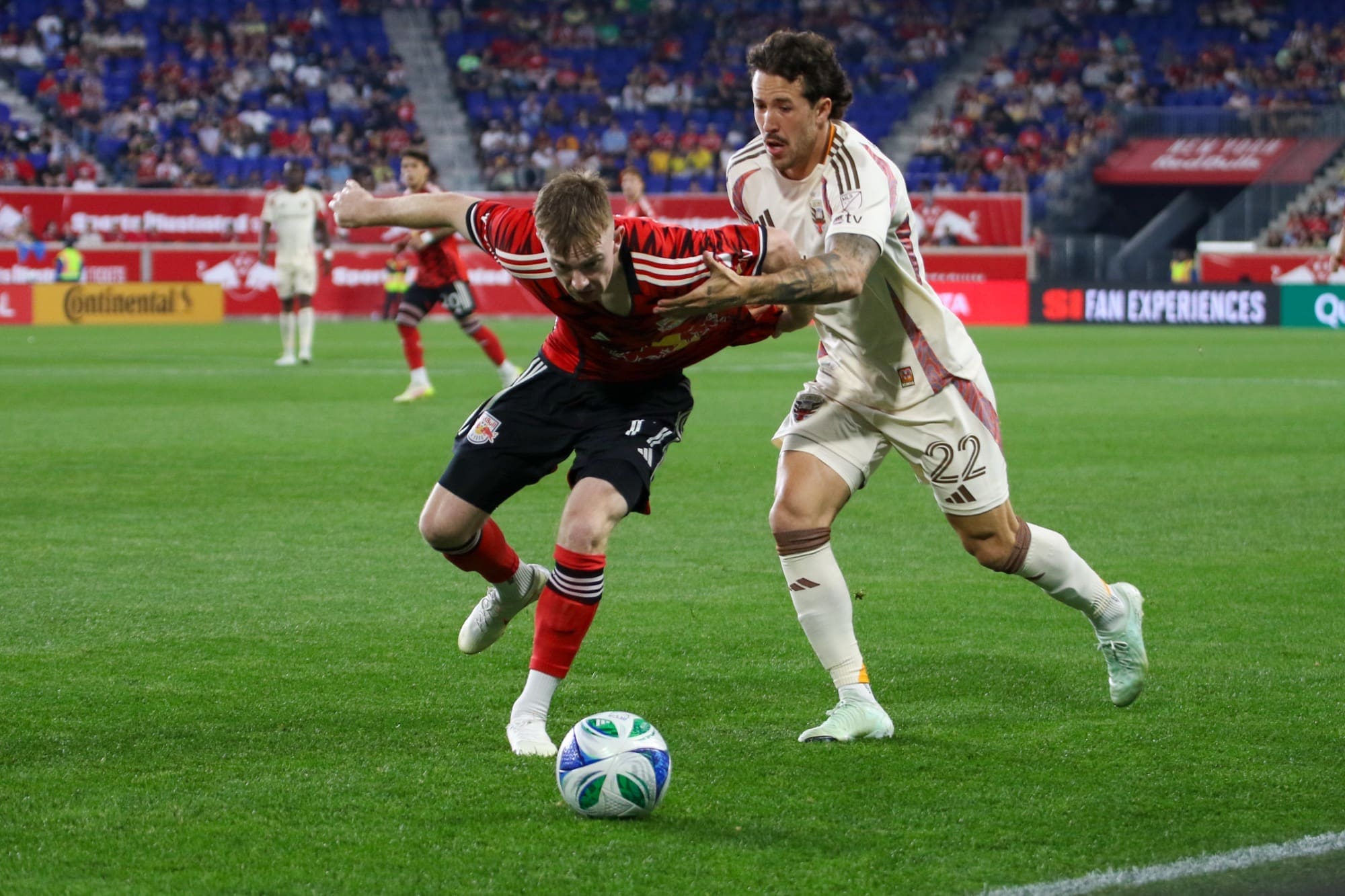 4/19/25, Harrison, New Jersey, Sports Illustrated Stadium, Cameron Harper #17 Forward New York Red Bulls And Aaron Herrera #22 Defender D.C. United battle for the ball during the second half Jose Pichirilo /Bad Dawg Sports. Jose Pichirilo /Bad Dawg Sports