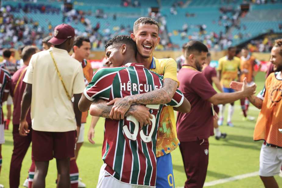 MIAMI GARDENS, FLORIDA - JUNE 25: Hercules #35 of Fluminense FC embraces Arthur Sales #9 of Mamelodi Sundowns FC following the FIFA Club World Cup 2025 group F match between Mamelodi Sundowns FC and Fluminense FC at Hard Rock Stadium on June 25, 2025 in Miami Gardens, Florida. (Photo by Hector Vivas - FIFA/FIFA via Getty Images)