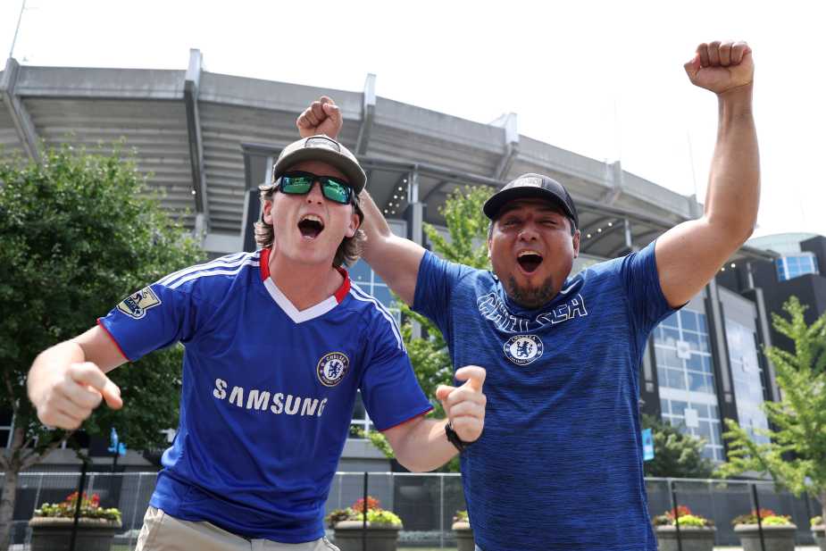 CHARLOTTE, NORTH CAROLINA - JUNE 28: Fans of Chelsea FC pose for a photo outside of the stadium prior to the FIFA Club World Cup 2025 round of 16 match between SL Benfica and Chelsea FC at Bank of America Stadium on June 28, 2025 in Charlotte, North Carolina. (Photo by Jared C. Tilton - FIFA/FIFA via Getty Images)