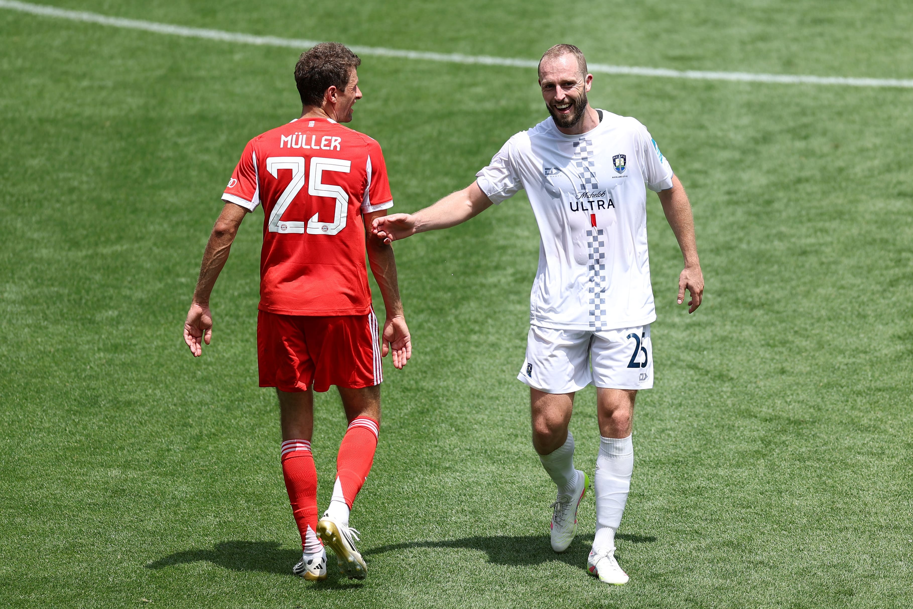 Thomas Mueller #25 of FC Bayern Munchen interacts with Michael den Heijer #25 of Auckland City FC during the FIFA Club World Cup 2025 group C match between FC Bayern München and Auckland City FC at TQL Stadium
