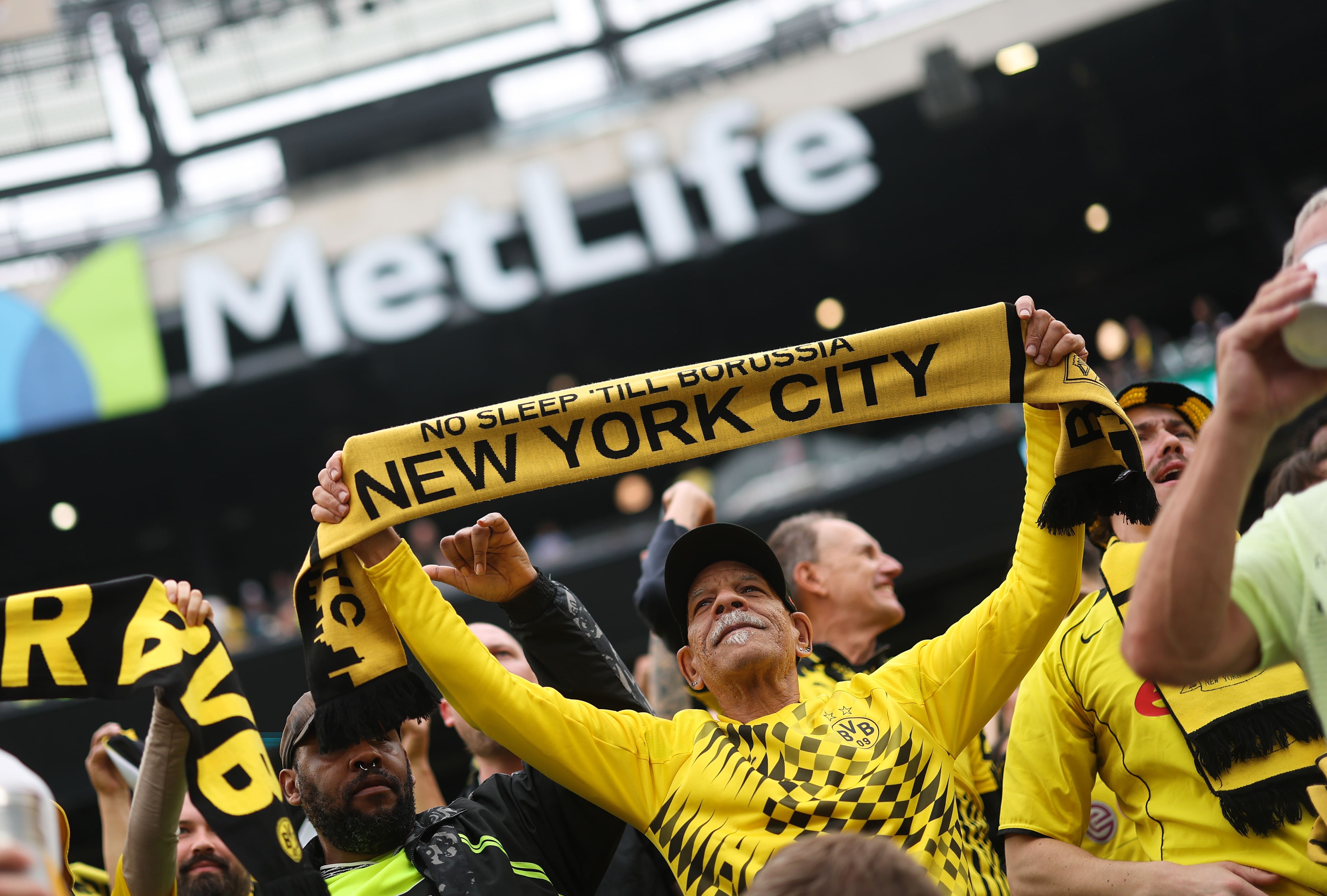 EAST RUTHERFORD, NEW JERSEY - JUNE 17: Fans of Borussia Dortmund cheer prior to the FIFA Club World Cup 2025 group F match between Fluminense FC and Borussia Dortmund at MetLife Stadium on June 17, 2025 in East Rutherford, New Jersey. (Photo by Carl Recine - FIFA/FIFA via Getty Images)