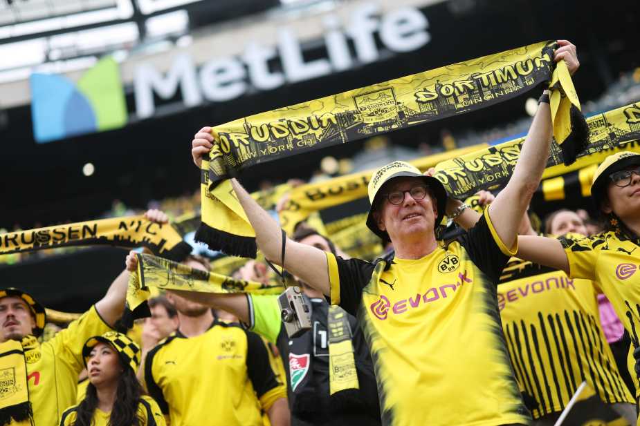 EAST RUTHERFORD, NEW JERSEY - JUNE 17: Fans of Borussia Dortmund cheer inside the stadium prior to the FIFA Club World Cup 2025 group F match between Fluminense FC and Borussia Dortmund at MetLife Stadium on June 17, 2025 in East Rutherford, New Jersey. (Photo by Carl Recine - FIFA/FIFA via Getty Images)