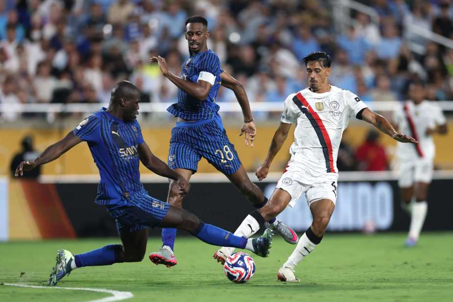 ORLANDO, FLORIDA - JUNE 30: Kalidou Koulibaly #3 of Al Hilal battles for possession with Tijjani Reijnders #4 of Manchester City during the FIFA Club World Cup 2025 round of 16 match between Manchester City and Al-Hilal at Camping World Stadium on June 30, 2025 in Orlando, Florida. (Photo by Elsa - FIFA/FIFA via Getty Images)