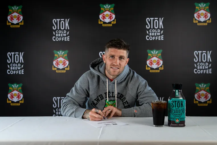 Josh Windass signing a contract with Wrexham AFC
