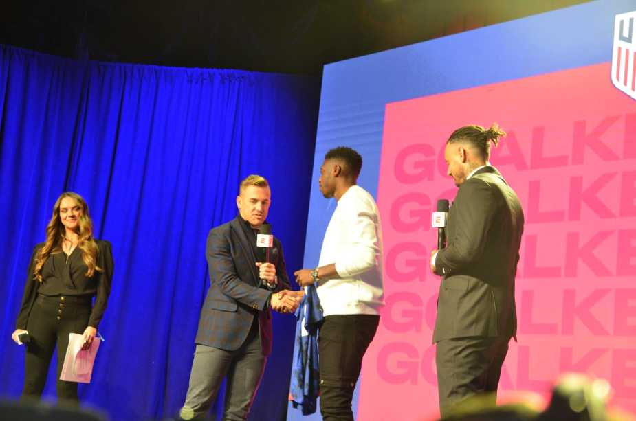 Sean Johnson speaks with Taylor Twellman in front of the media and fans.