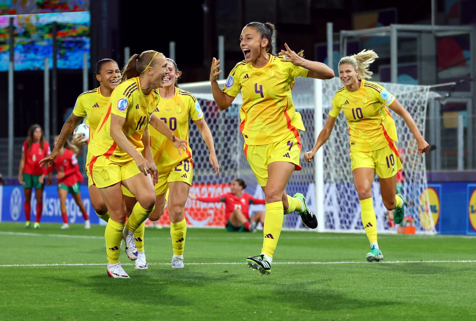 SION, SWITZERLAND - JULY 11: Amber Tysiak of Belgium celebrates scoring a goal with teammates which was later ruled out following a VAR review during the UEFA Women's EURO 2025 Group B match between Portugal and Belgium at Stade de Tourbillon on July 11, 2025 in Sion, Switzerland. (Photo by Molly Darlington - UEFA/UEFA via Getty Images)