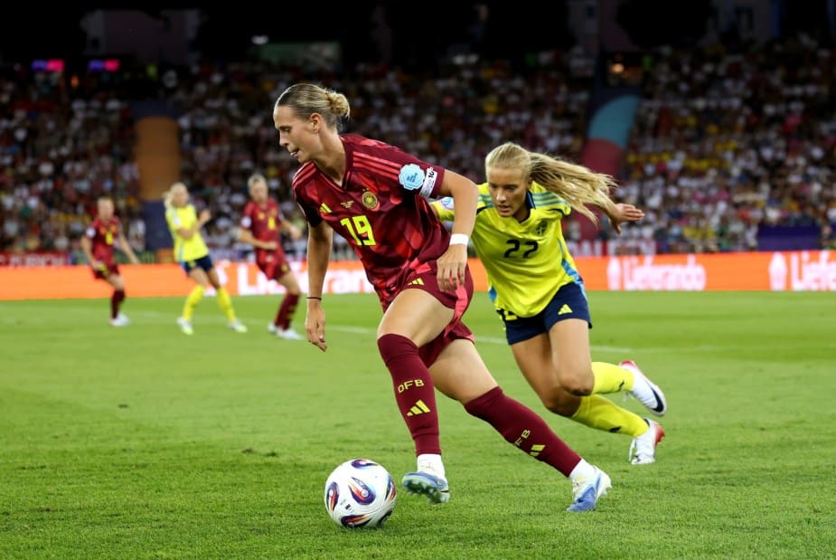 ZURICH, SWITZERLAND - JULY 12: Klara Buehl of Germany is challenged by Smilla Holmberg of Sweden during the UEFA Women's EURO 2025 Group C match between Sweden and Germany at Stadion Letzigrund on July 12, 2025 in Zurich, Switzerland. (Photo by Maja Hitij - UEFA/UEFA via Getty Images)