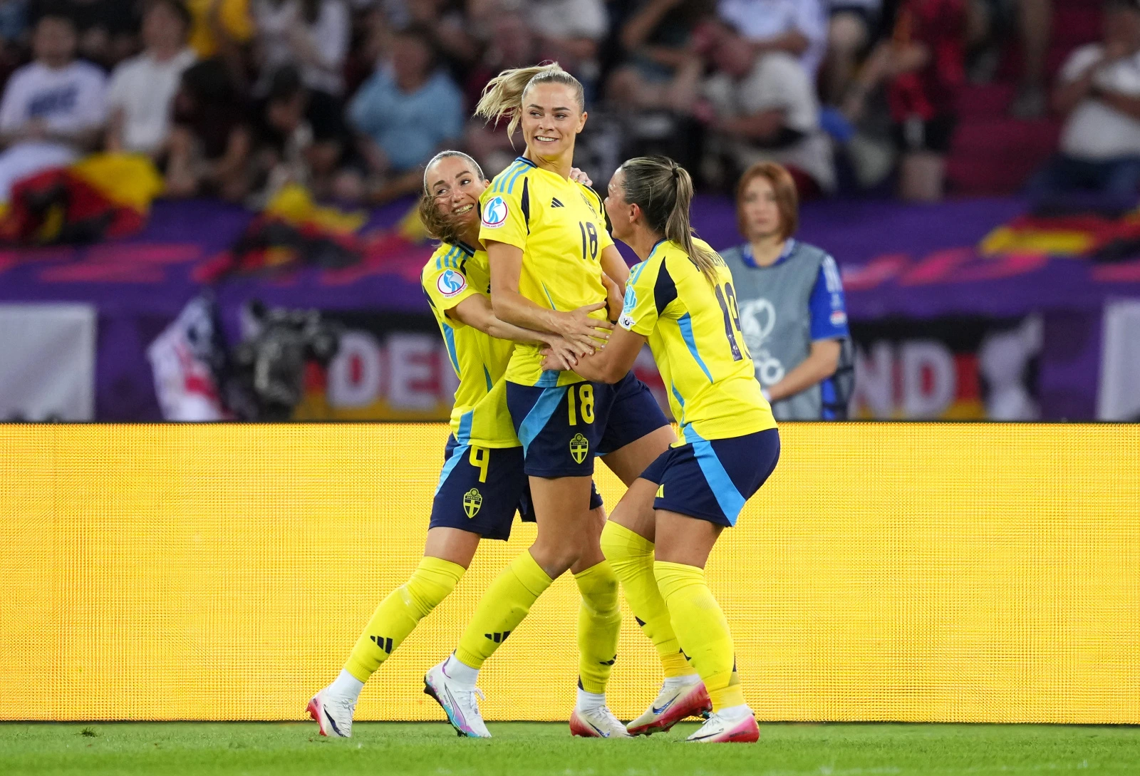 ZURICH, SWITZERLAND - JULY 12: Fridolina Rolfo of Sweden celebrates scoring her team's third goal from the penalty spot with teammates Kosovare Asllani and Johanna Rytting Kaneryd during the UEFA Women's EURO 2025 Group C match between Sweden and Germany at Stadion Letzigrund on July 12, 2025 in Zurich, Switzerland. (Photo by Alex Caparros - UEFA/UEFA via Getty Images)