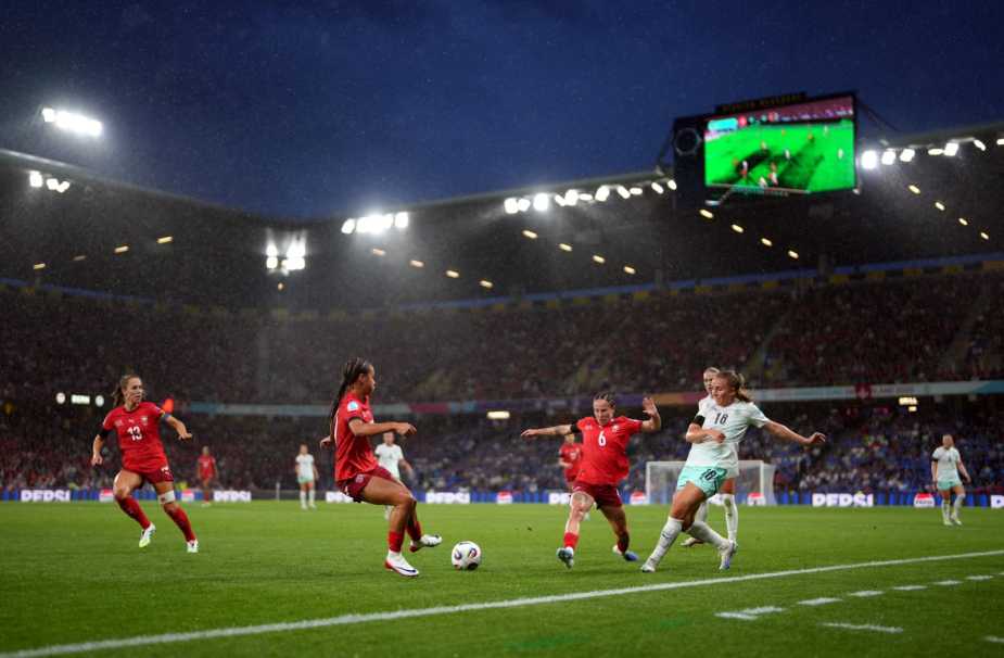 BERN, SWITZERLAND - JULY 06: Gudrun Arnardottir of Iceland passes the ball whilst under pressure from Gaeraldine Reuteler of Switzerland during the UEFA Women's EURO 2025 Group A match between Switzerland and Iceland at Stadion Wankdorf on July 06, 2025 in Bern, Switzerland. (Photo by Aitor Alcalde - UEFA/UEFA via Getty Images)
