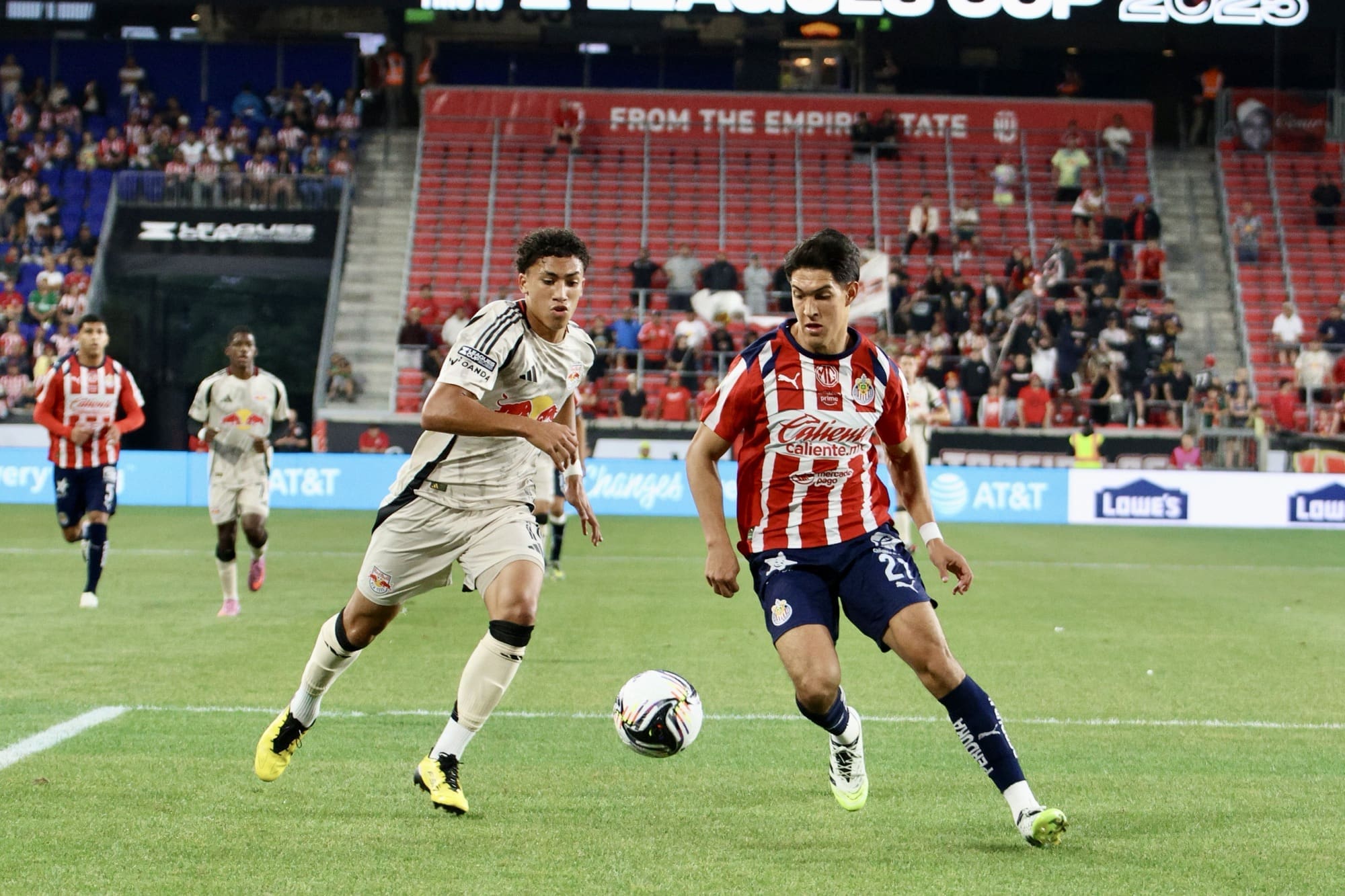 7/31/25, Harrison, New Jersey, Sports iIlustrated Stadium. José Castillo of Chivas and Julian Hall of the New York Red Bulls battle for possession during the Leagues Cup match. Jose Pichirilo. Bad Dawg Sports