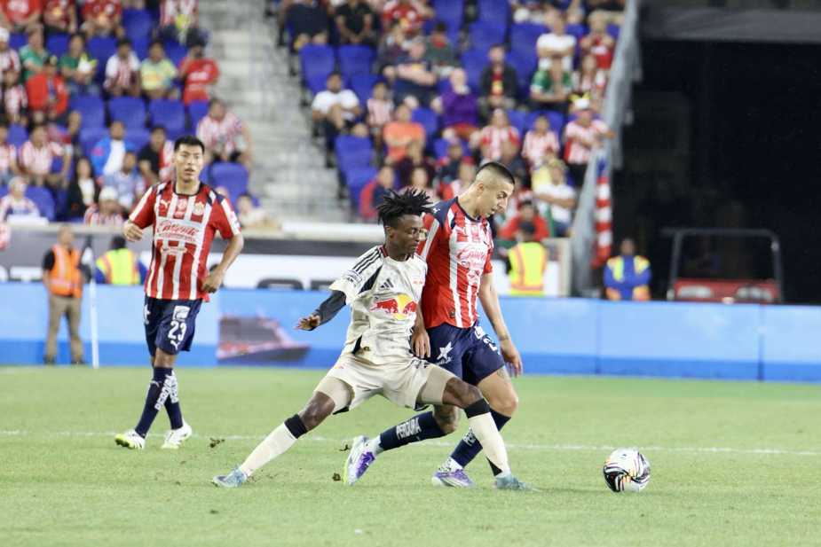 7/31/25, Harrison, New Jersey, Sports iIlustrated Stadium. Roberto Alvarado of Chivas is challenged by Mohammed Sofo of the New York Red Bulls during the Leagues Cup match between Guadalajara and New York Red Bulls. by Jose Pichirilo / Bad Dawg Sports