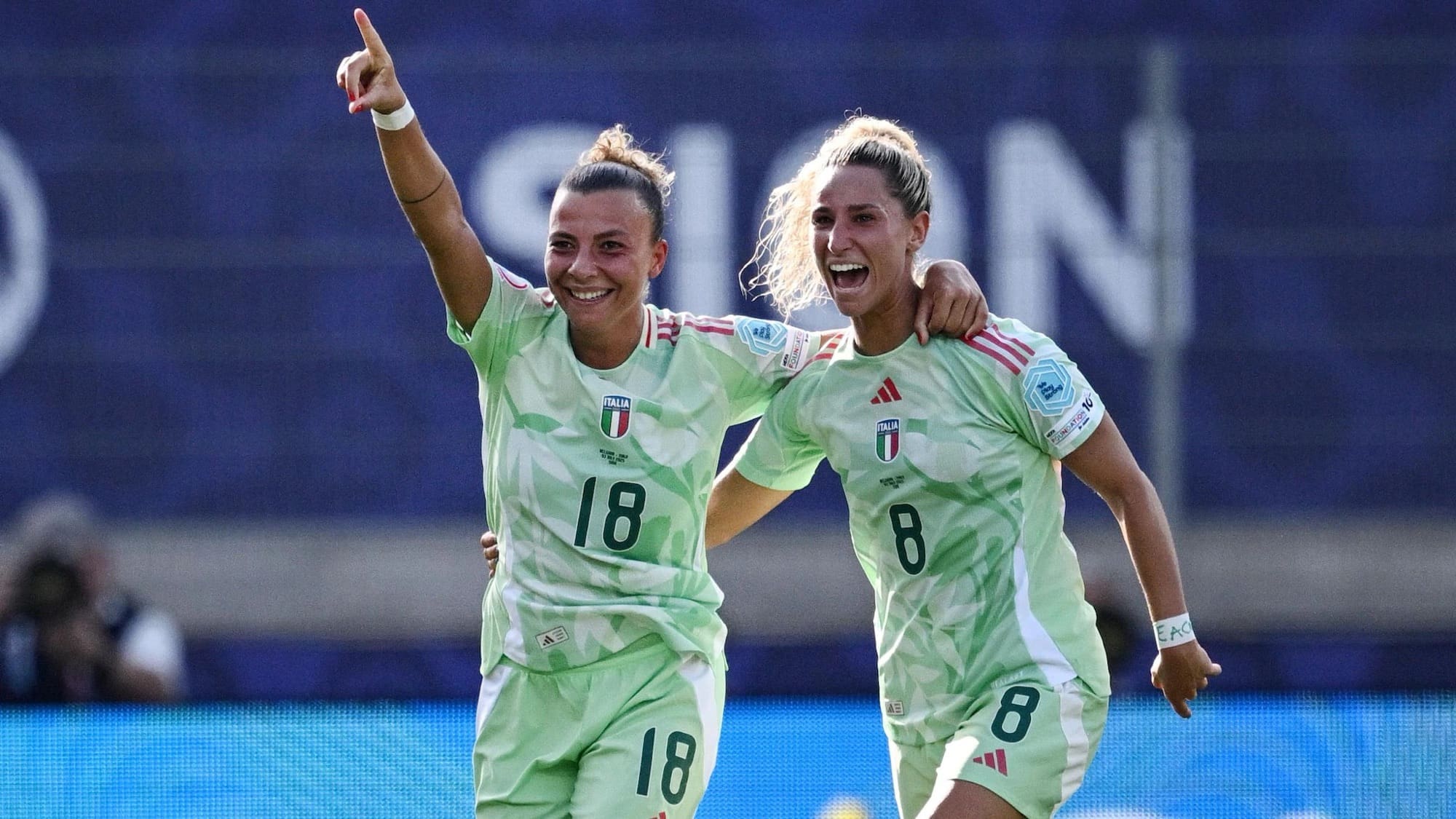 SION, SWITZERLAND, JULY 3RD: Arianna Caruso (left) enjoys her goal for Italy against Belgium in their Women's EURO opener, Mandatory Photo Credit: Getty Images
