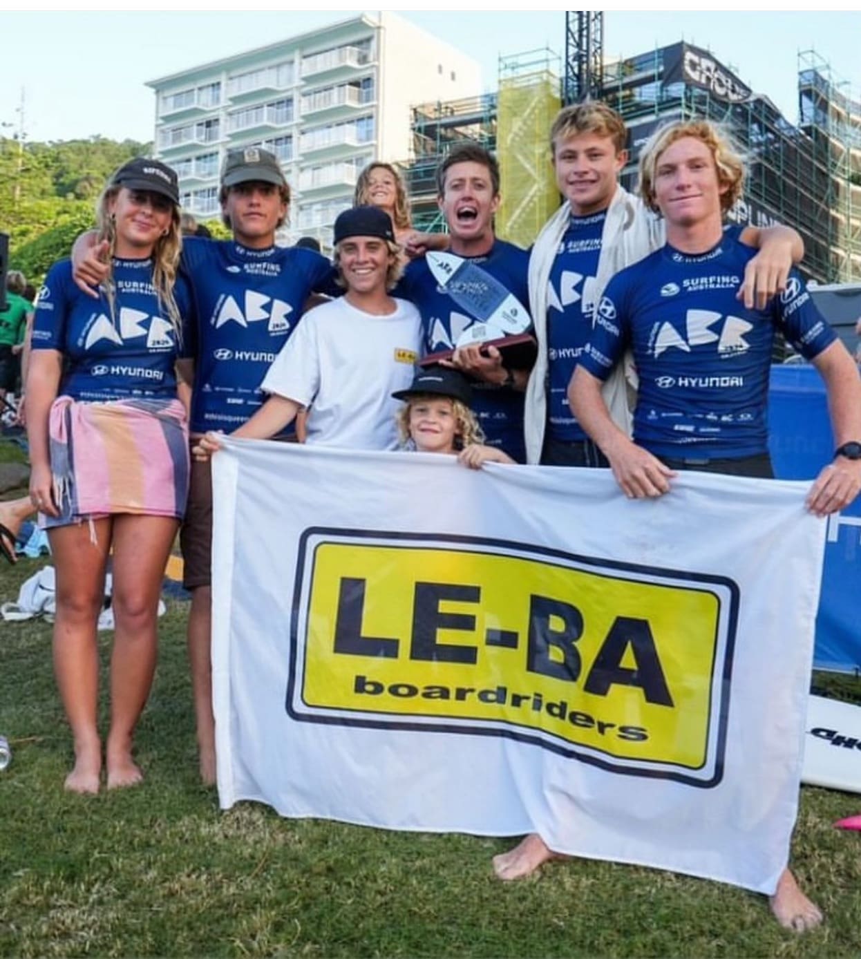 Harry O'Brien with sponsor banner