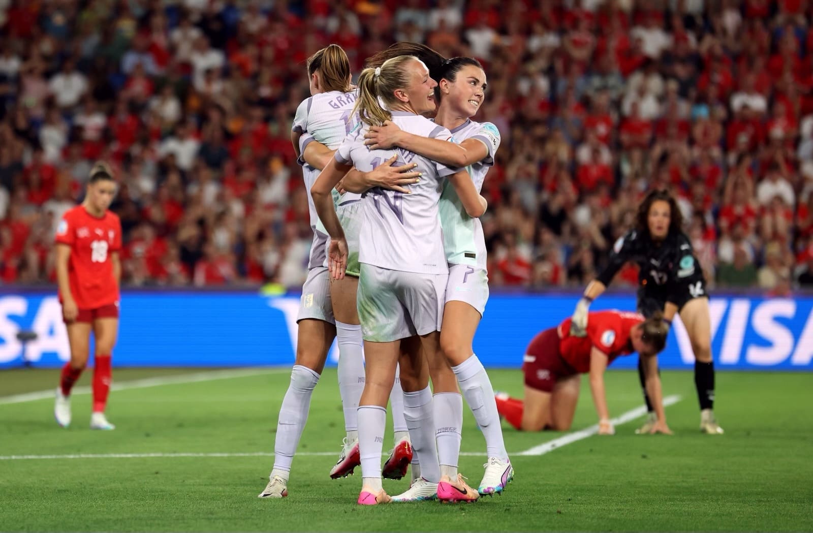 BASEL, SWITZERLAND - JULY 02: Frida Maanum and Ingrid Syrstad Engen of Norway celebrate after Julia Stierli of Switzerland scores a own goal during the UEFA Women's EURO 2025 Group A match between Switzerland and Norway at St. Jakob-Park on July 02, 2025 in Basel, Switzerland. (Photo by Maja Hitij - UEFA/UEFA via Getty Images)