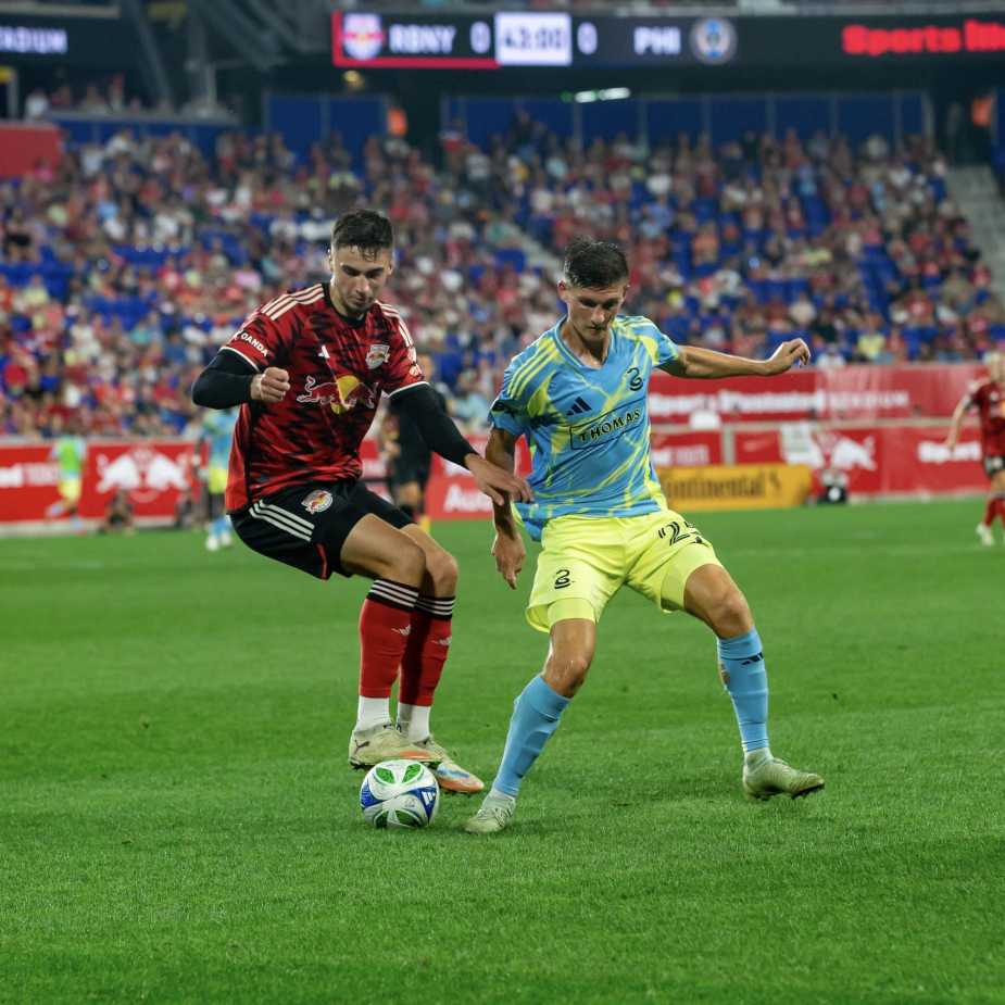 8/16/25, Harrison, New Jersey, Sports illustrated Stadium, New York Red Bulls’ Noah Eile (#3) battles for the ball against Chris Donovan (#25) of the Philadelphia Union. Mandatory Credit: Israel Contreras Gonzalez/Bad Dawg Sports