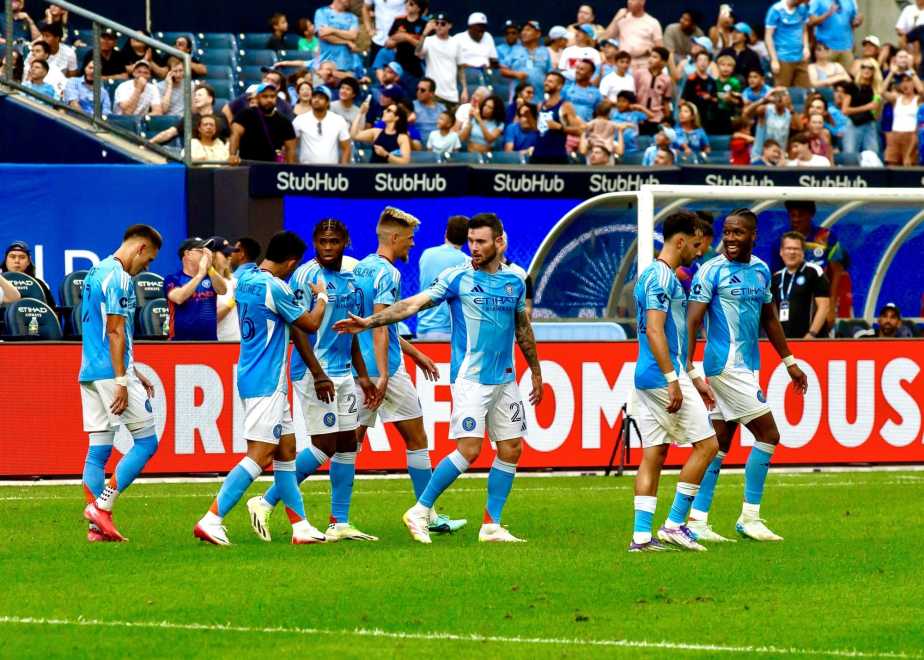 Andres Perea number 8 of New York City FC celebrates with teammates after scoring equalizing goal against Nashville SC