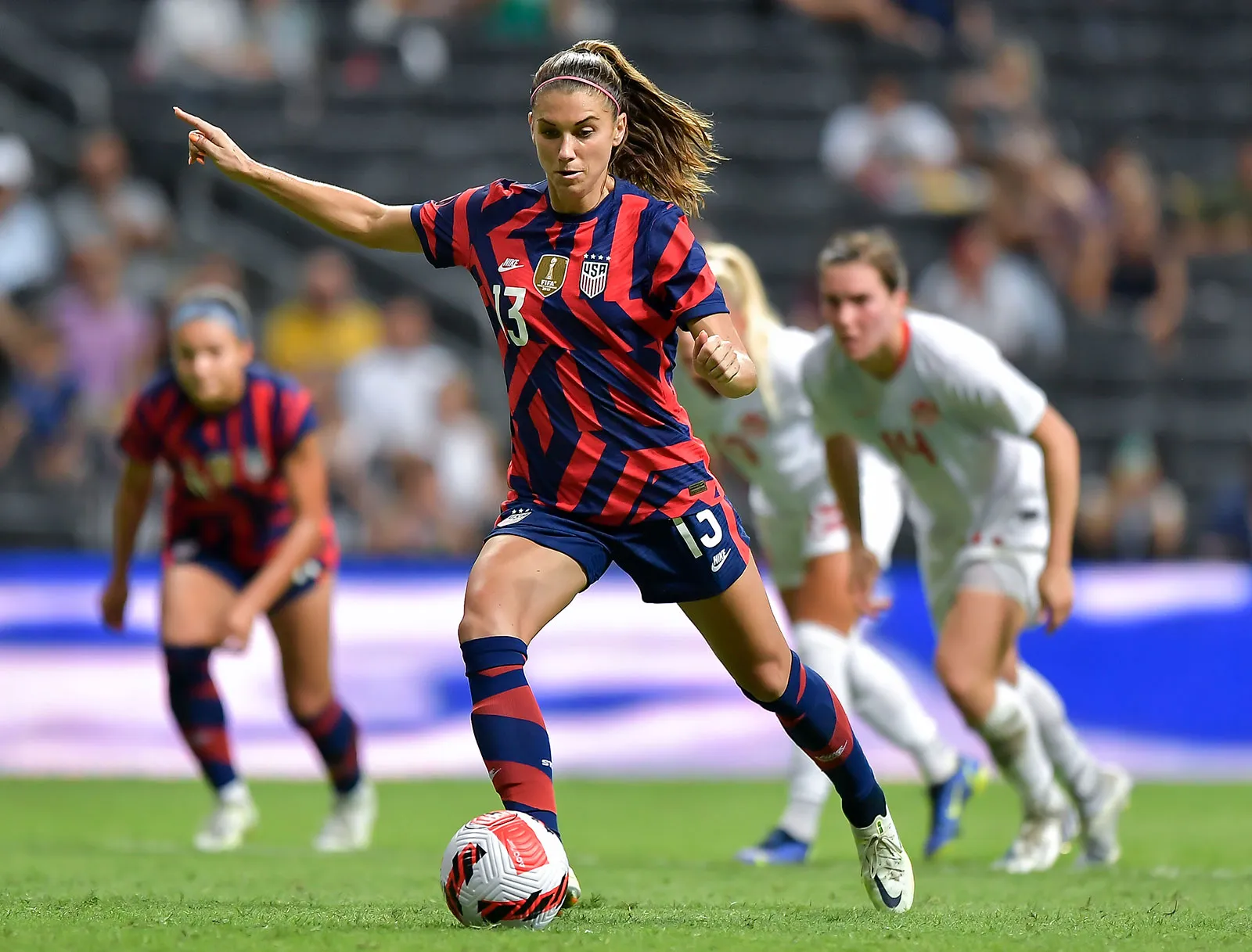 Alex Morgan takes a penalty kick and misses.