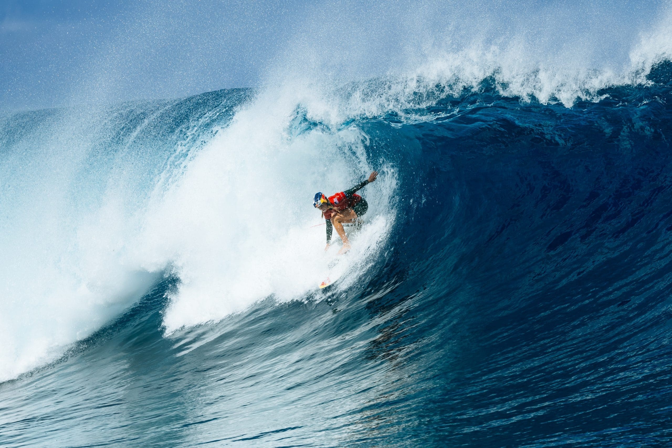 Caitlin Simmers surfing deep inside powerful Teahupo'o barrel wave during Lexus Tahiti Pro