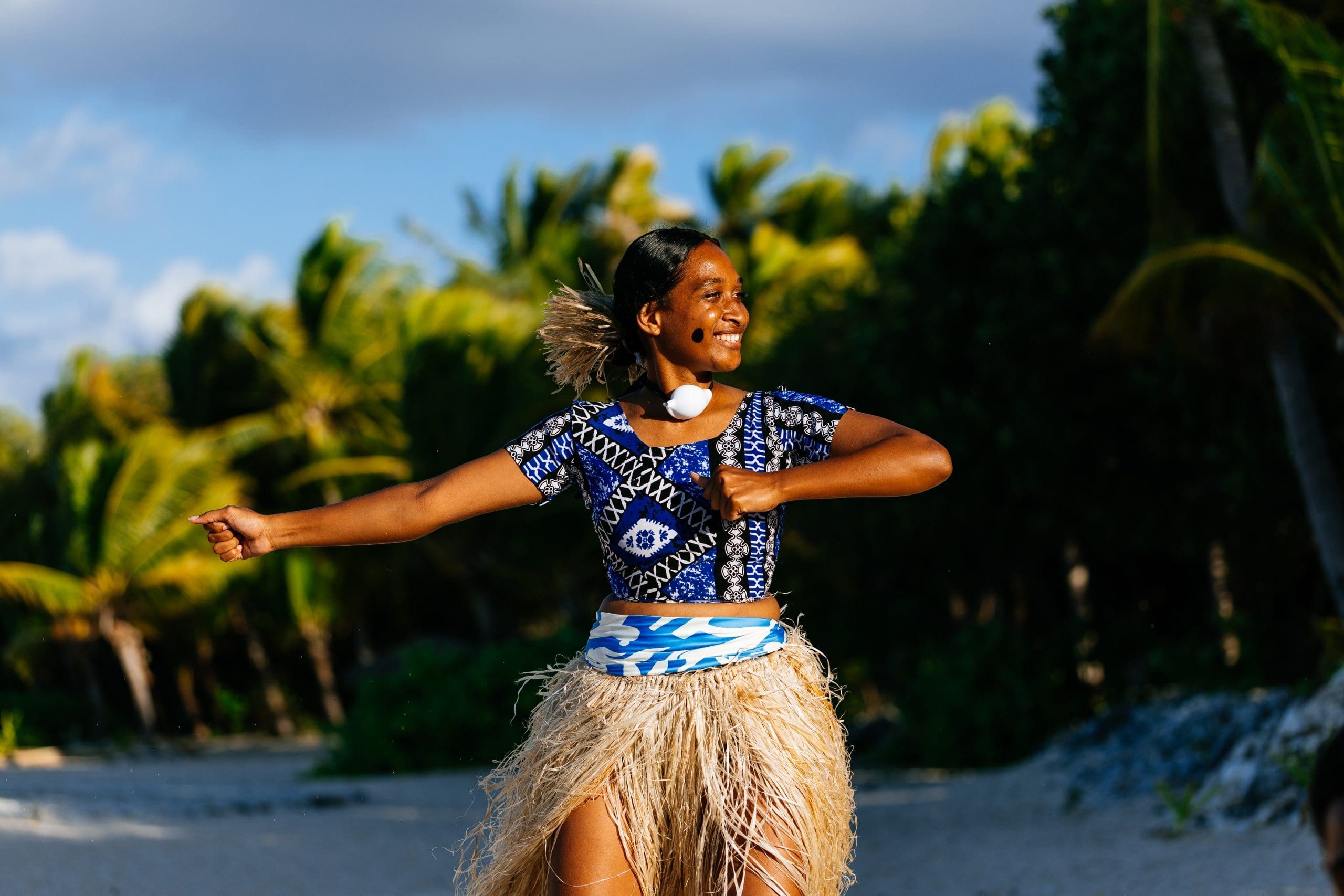 Traditional Fijian dancer performs cultural celebration during 2025 Lexus WSL Finals Fiji opening ceremony at Tavarua Island