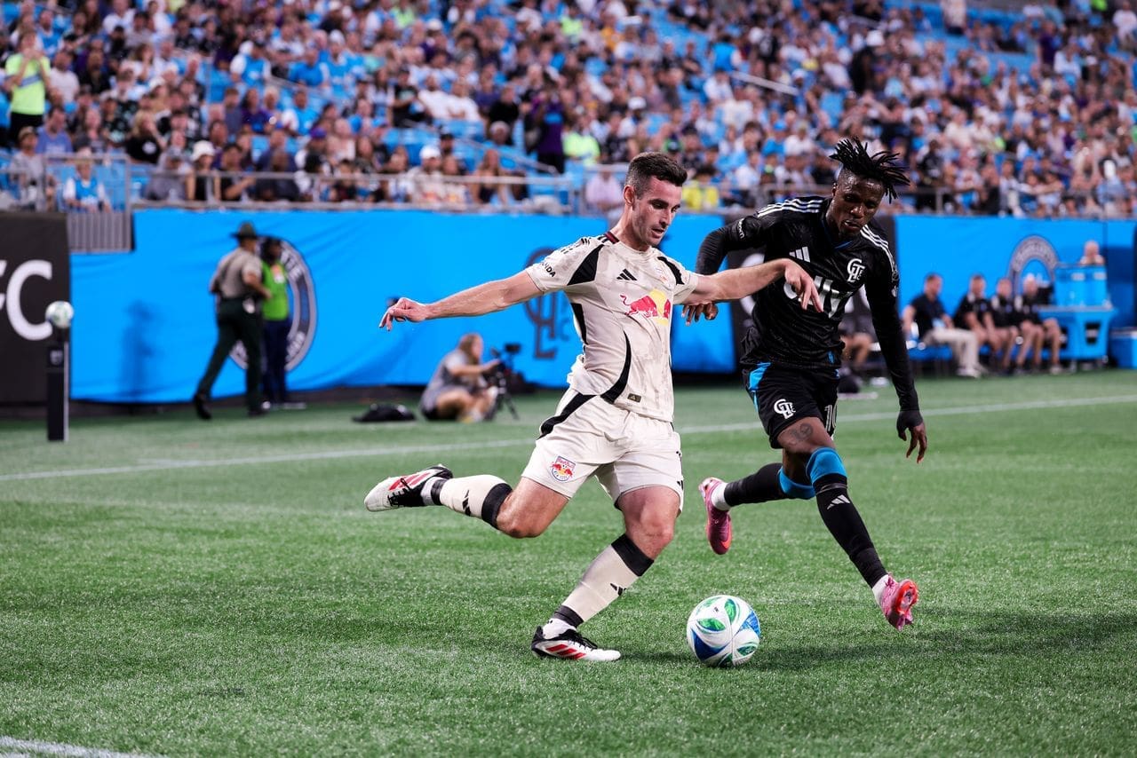 8/24/2025 Bank of America Stadium, Charlotte, NC Dylan Nealis plays the ball against Wilfred Zaha. Mandatory Credit: New York Red Bulls