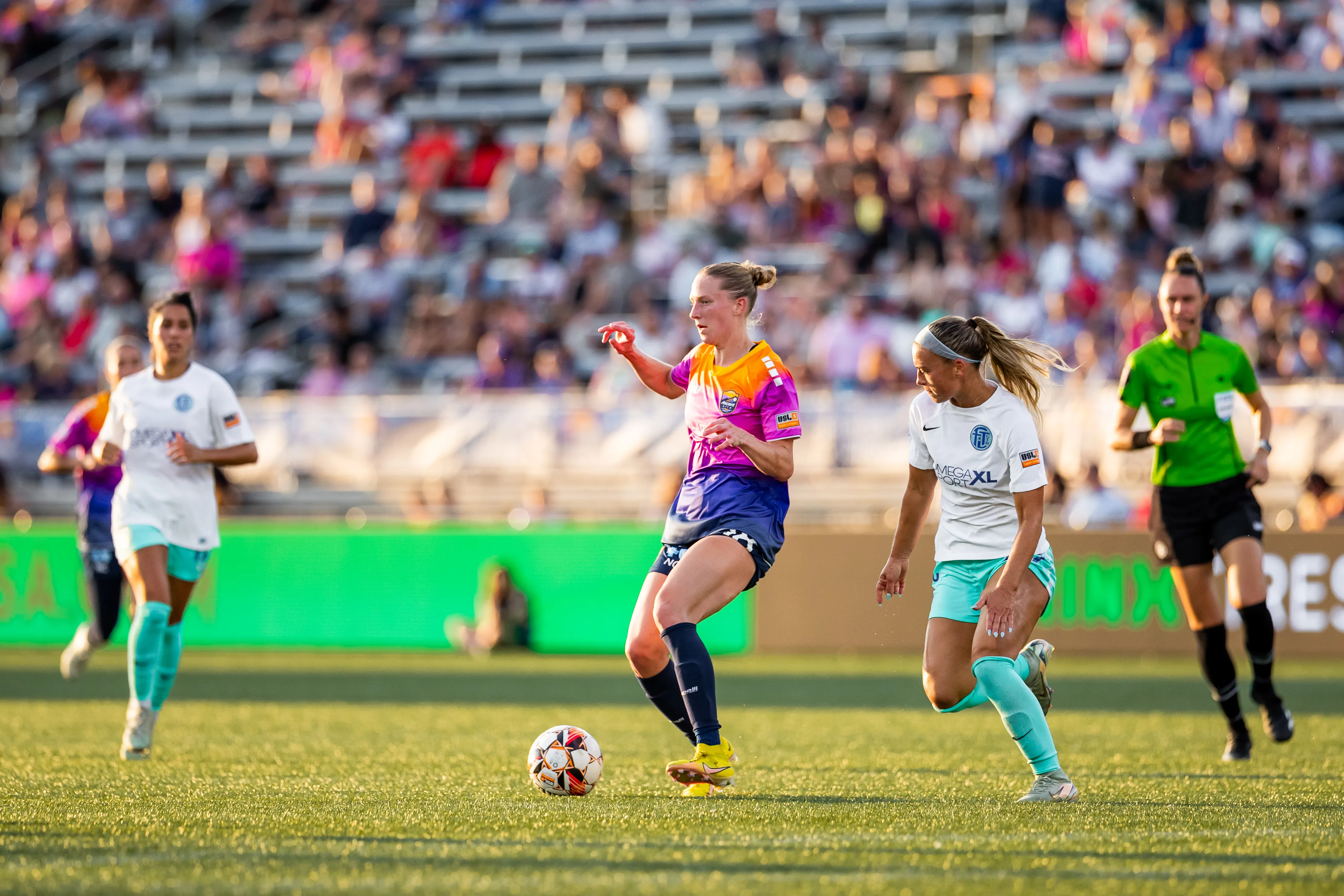 8/30/2025 Carolina Player battling 1 v 2 in the midfield against Fort Lauderdale UTD. Mandatory Credit Carolina Ascent