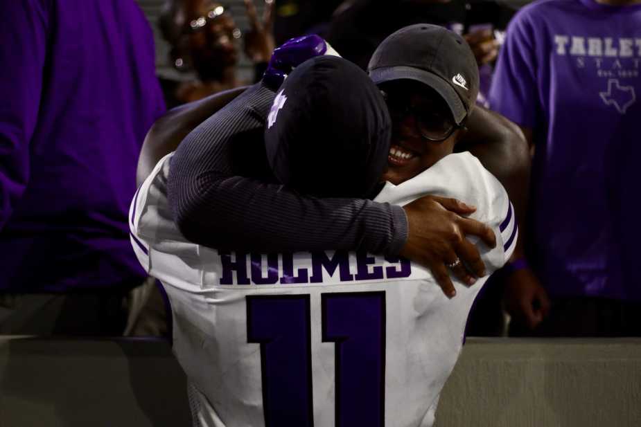 8/28/25, West Point, New York, Michie Stadium, Tarleton State linebacker Yasir Holmes (#11) celebrates with a fan after the victory over Army. Mandatory Credit: Jose Pichirilo/Bad Dawg Sports