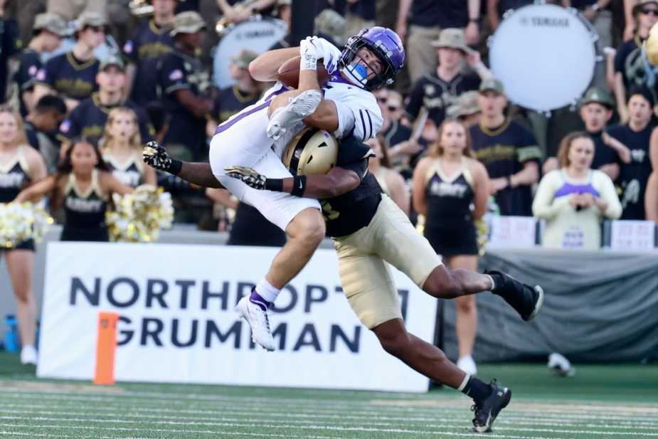 8/28/25, West Point, New York, Michie Stadium, Tarleton State wide receiver Peyton Kramer (#13) is tackled by Army defensive lineman Deshontez Gray (#98). Mandatory Credit: Jose Pichirilo/Bad Dawg Sports