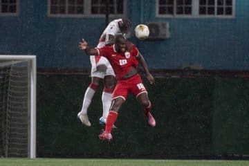 9/4/2025 Franklin Essed Stadium, Paramaribo, Suriname Cecelio Waterman Challenges the ball Mandatory Credit FEPAFUT