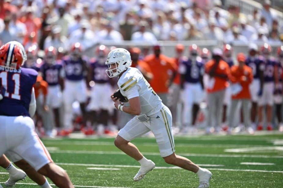 Georgia Tech quarterback Haynes King (#10) executing a keeper option run for a significant gain against Clemson