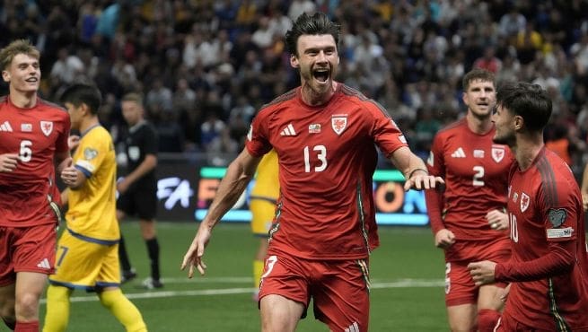Wales national team player celebrating goal during World Cup qualifying match against Kazakhstan