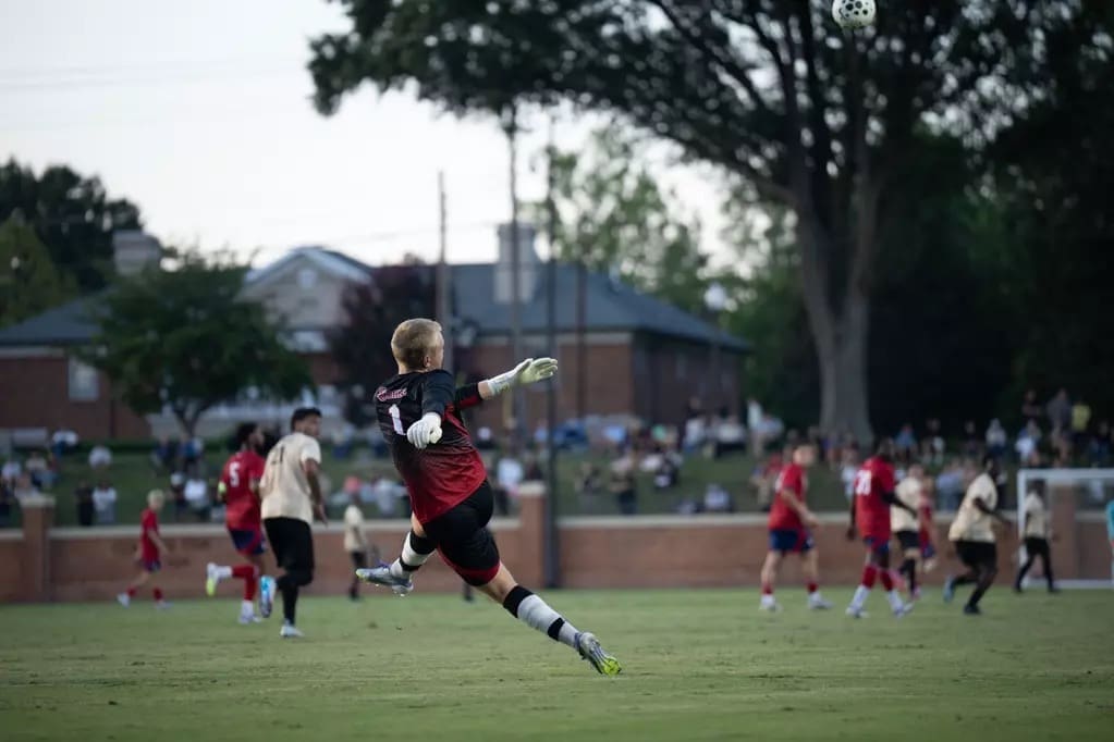 St. John's University goalkeeper Alec McLachlan makes a diving save during the Red Storm's 0-0 draw against No. 5 Wake Forest at Spry Stadium