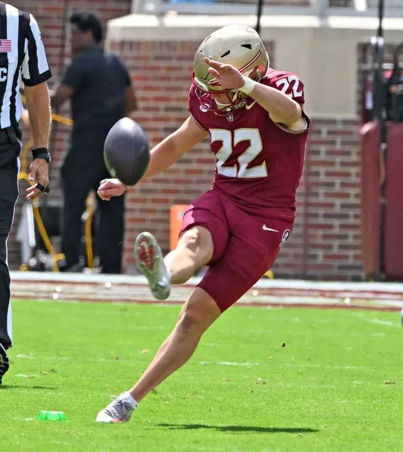 FSU kicker (#22) follows through on field goal attempt during 77-3 victory over East Texas A&M at Doak Campbell Stadium