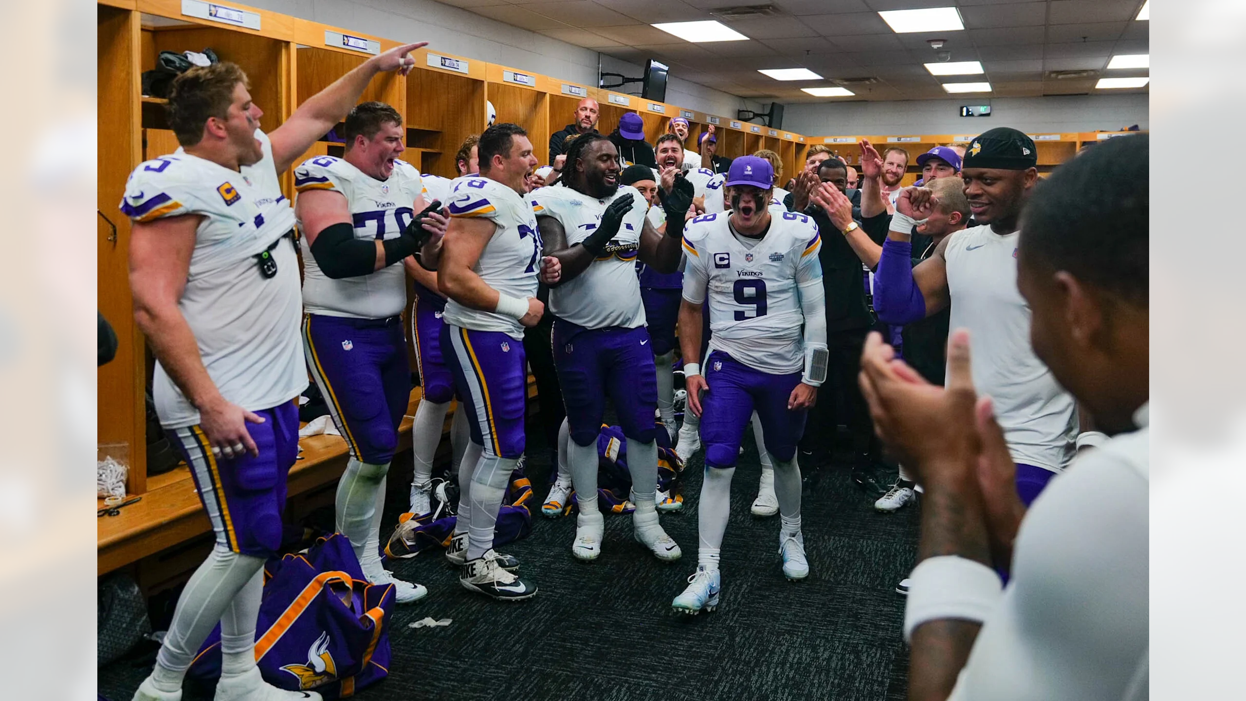 J.J. McCarthy celebrates passionately in the Vikings locker room after leading a dramatic fourth-quarter comeback victory against the Chicago Bears