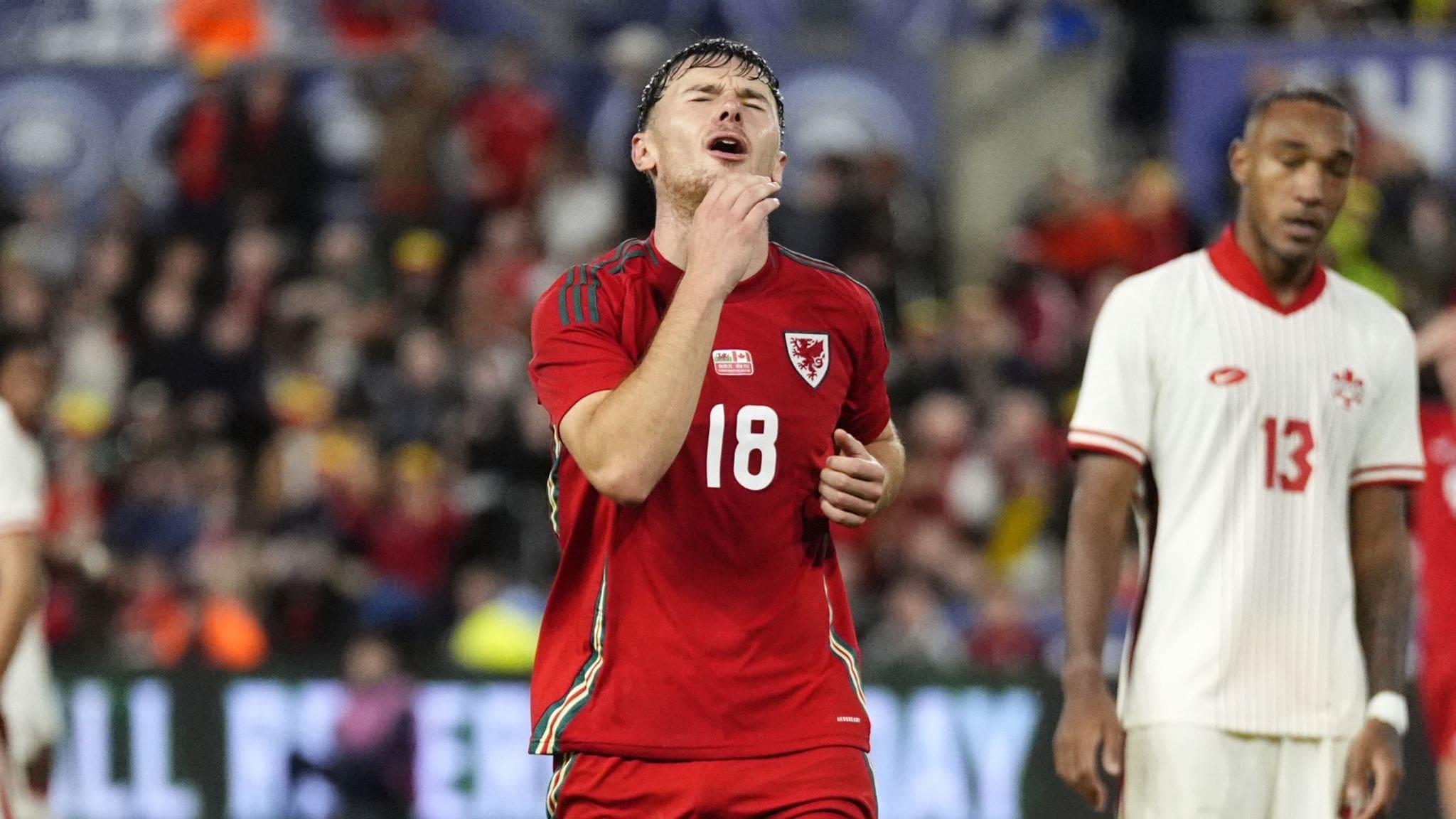 Wales striker Mark Harris shows frustration after final whistle as Wales loses 1-0 to Canada at Swansea.com Stadium, their first home defeat under Craig Bellamy