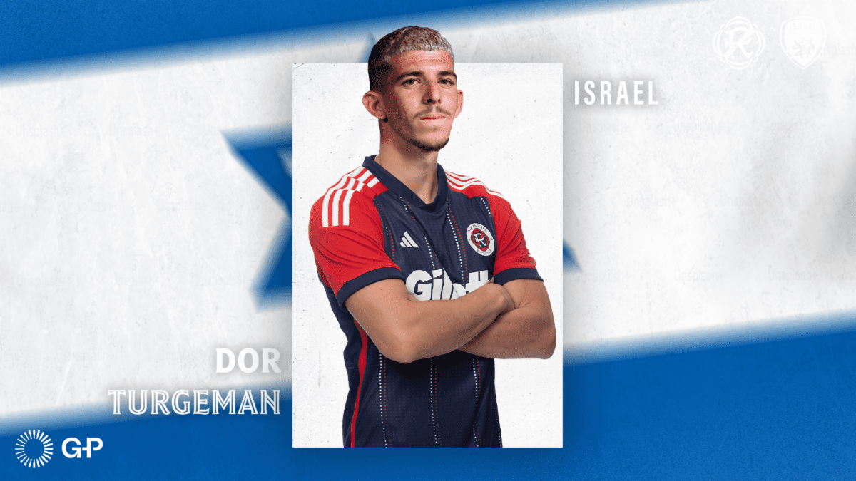 Dor Turgeman in New England Revolution and Israel national team jersey, standing with crossed arms